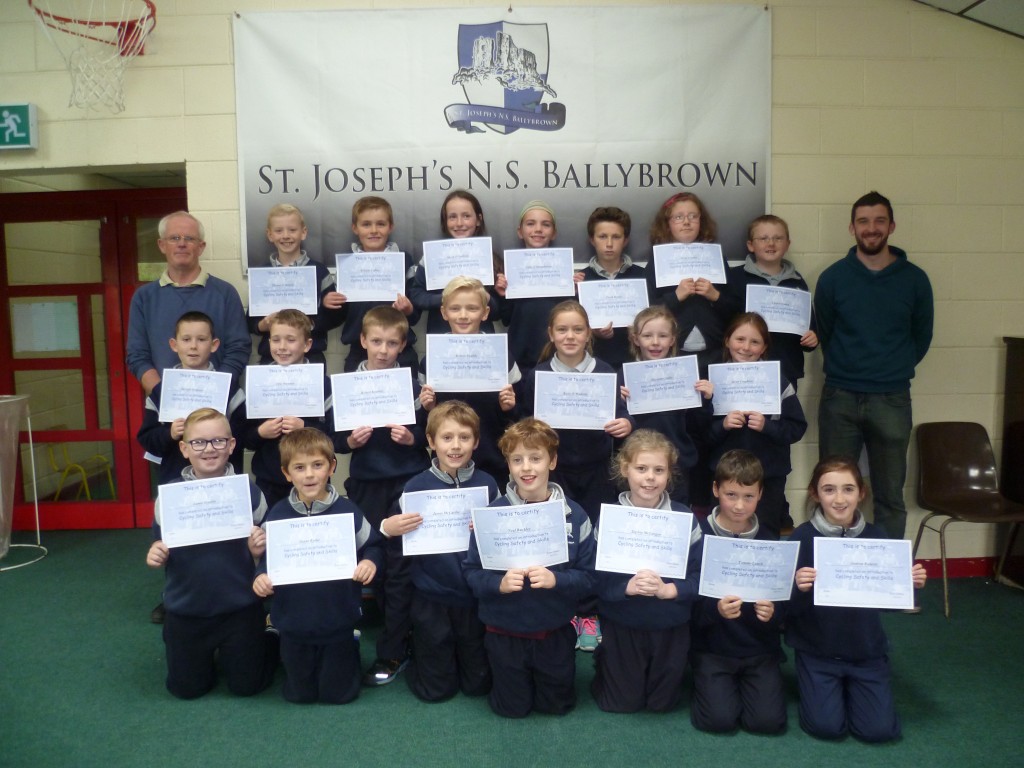 Third class in Ballybrown NS  proudly display their Cycling Safety certificates